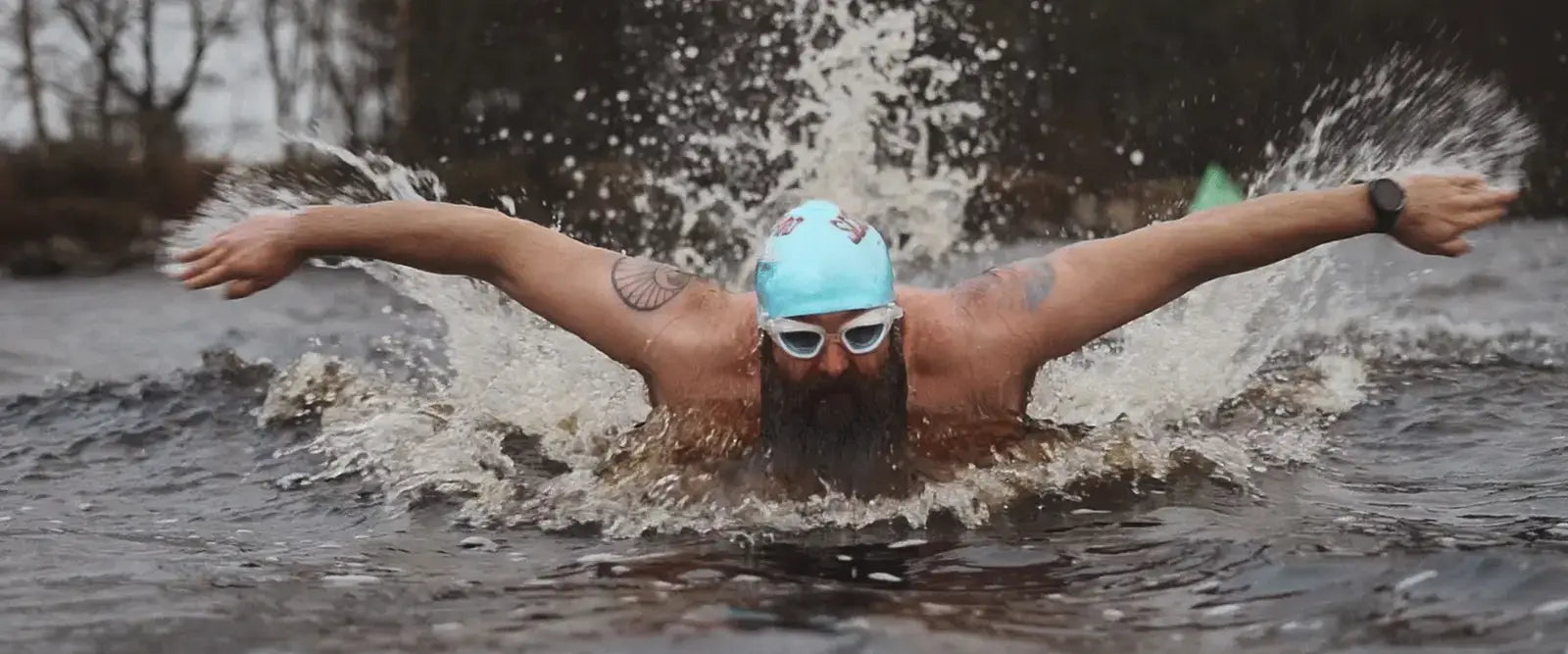 A man swimming butterfly stroke