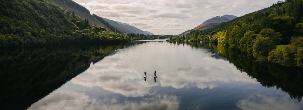 2 people paddleboarding in a lake