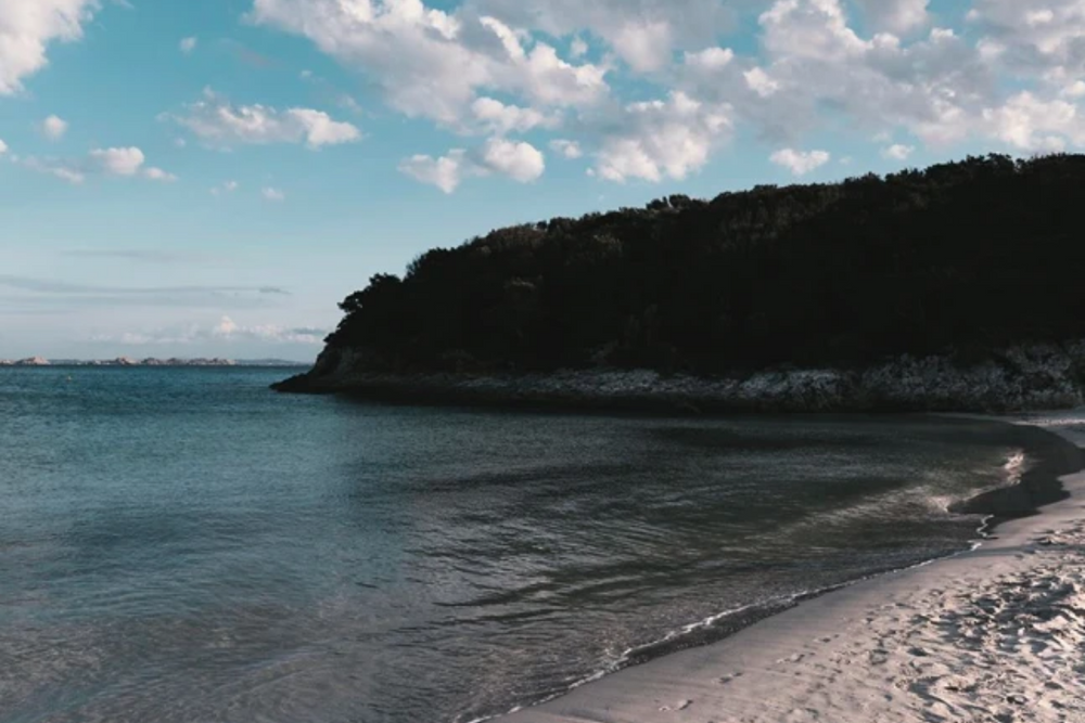 Paddleboarding in heavenly turquoise water gulf in Corsica