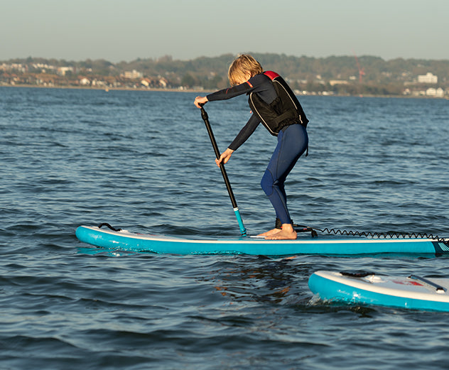 Child paddling 9’4” 3-in-1 Snapper MSL Kids Inflatable Paddle Board